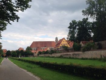 View of road against cloudy sky