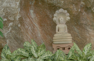 Close-up of statue against temple