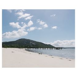 Scenic view of beach against sky