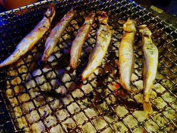 Close-up of meat on barbecue grill