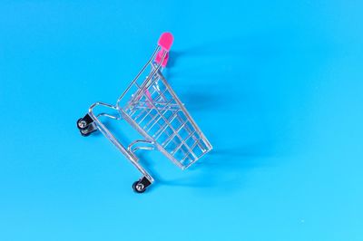 High angle view of toy car against blue background