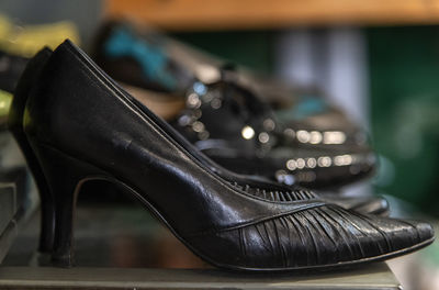 Close-up of shoes on table