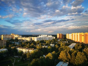 High angle view of buildings in city against sky