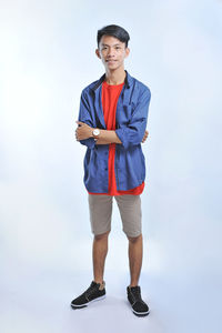 Confidence asian young man wear casual t-shirts with confident smiling