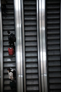 High angle view of people on escalator