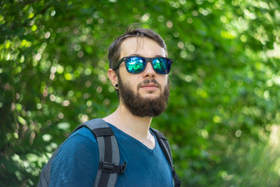 Portrait of young man wearing sunglasses