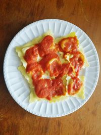 Directly above shot of ravioli in plate on table