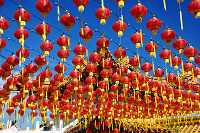 Low angle view of chinese lanterns against sky