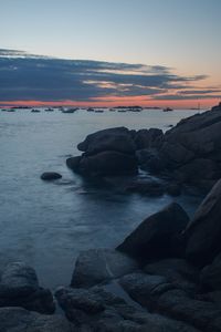 Scenic view of sea at sunset