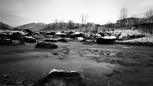 Scenic view of frozen lake against sky