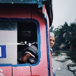 Reflection of man in water