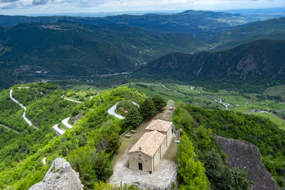 High angle view of townscape against mountain