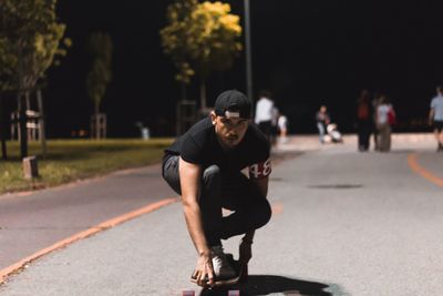 Full length of man on street in city