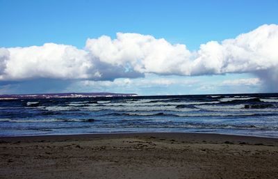 Scenic view of beach against sky