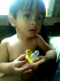 Close-up portrait of cute baby girl