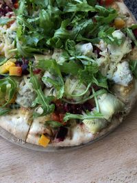 High angle view of chopped vegetables in plate on table