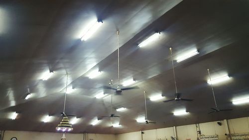 Low angle view of illuminated ceiling