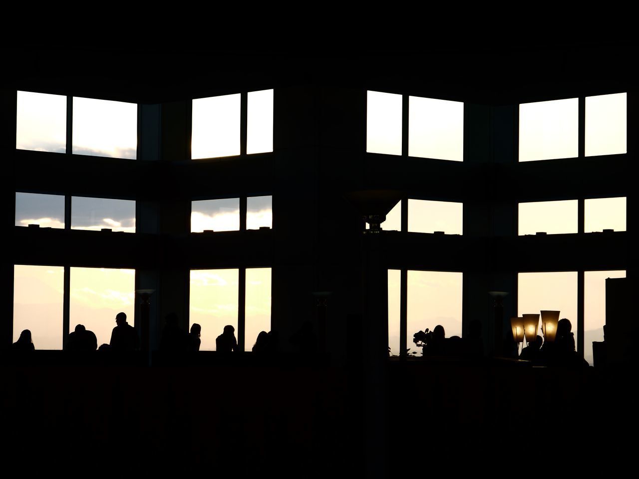 SILHOUETTE OF PEOPLE IN CITY