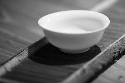 Close-up of cup on table