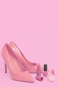 High heels against pink background