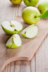 Close-up of apples on cutting board