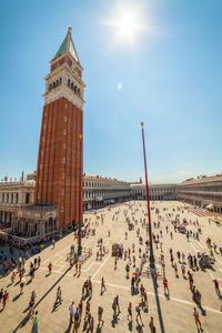 Crowd at san marco campanile against sky