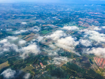 Aerial view of city against sky