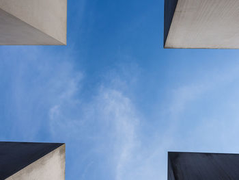 Low angle view of building against blue sky