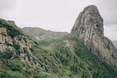 Scenic view of rocky mountains against clear sky