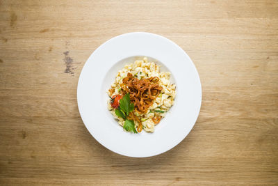 High angle view of food served on table