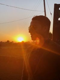 Portrait of silhouette man against sky during sunset