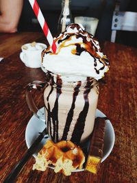 Close-up of ice cream cone on table