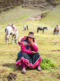 Women sitting on grass