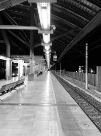 Railroad station platform at night