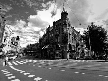 City street against cloudy sky