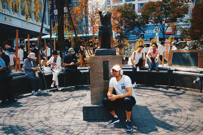 Group of people sitting on chair