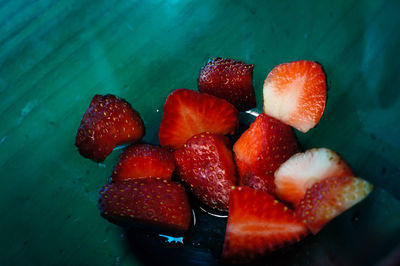 Close-up of strawberries in leaf