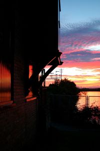 Silhouette of lake at sunset