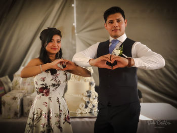 Portrait of a smiling young couple