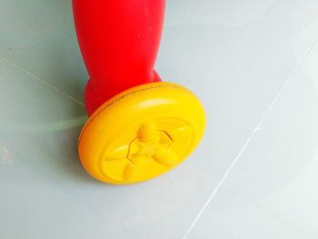 High angle view of yellow water on floor