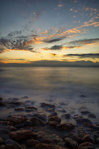 Scenic view of sea against sky during sunset