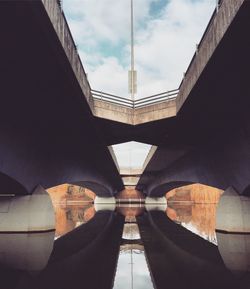 Bridge over river against sky