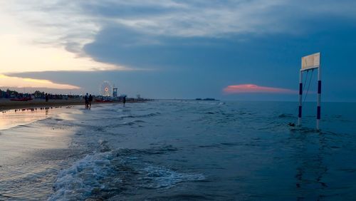 Scenic view of sea at sunset