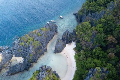 High angle view of rocks by sea