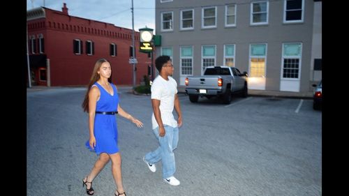 People walking on street in city