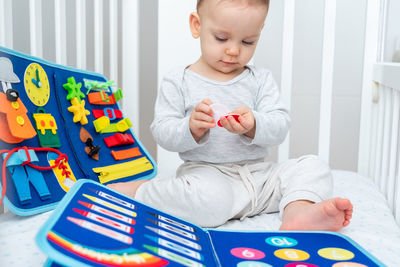 Boy playing with toy blocks