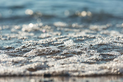 Close-up of wave on beach