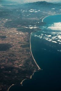 Aerial view of island amidst sea