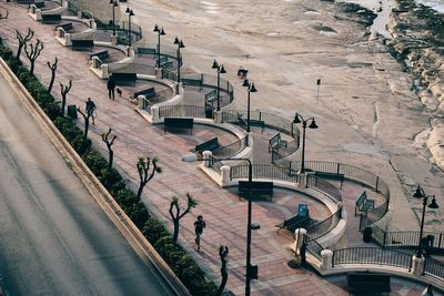 High angle view of observation point at promenade by low tide sea