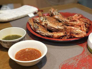 High angle view of meat in bowl on table